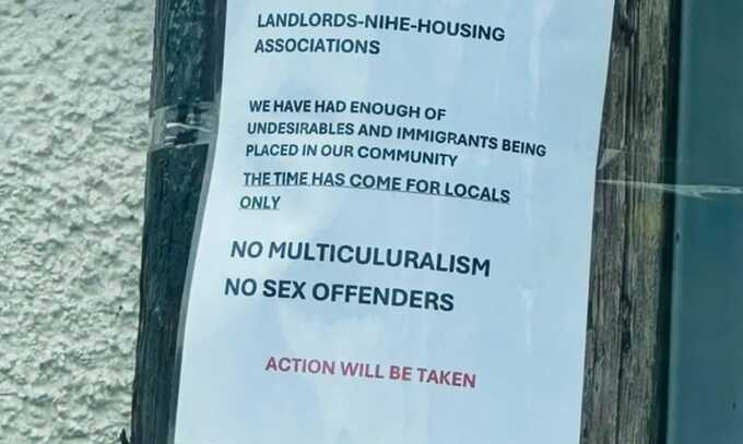 One of the anti-immigrant posters put up by the suspected loyalist gang.