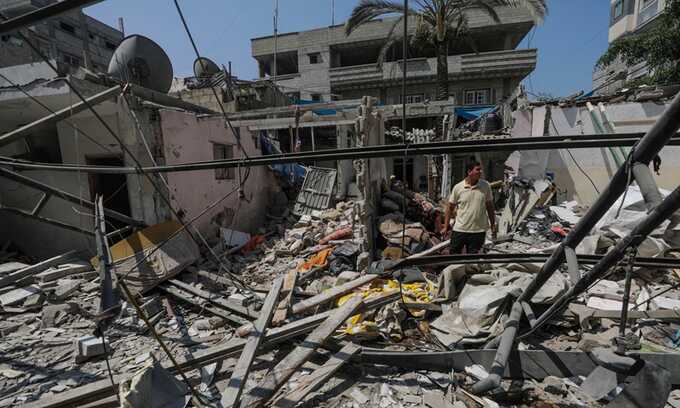 A destroyed house following an Israeli airstrike in Nuseirat refugee camp. Photograph: Mohammed Saber/EPA