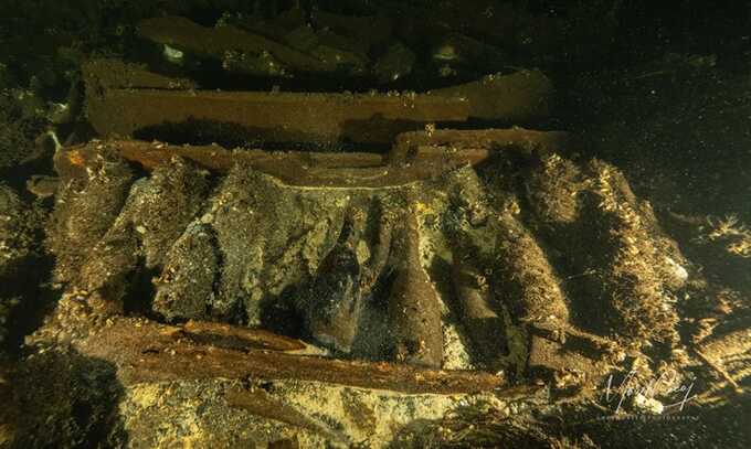 Champagne bottles still neatly lined up on the sailing ship, which sank in the Baltic sea about 170 years ago. Photograph: Tomasz Stachura/Baltictech