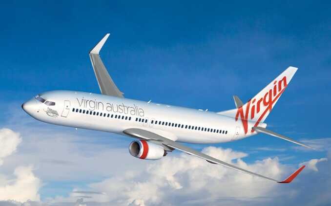 Tourist dies after collapsing on a Virgin Australia flight in front of shocked passengers