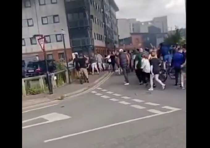 Far-right rioters shout ’p***’ as they drag Asian man from his car