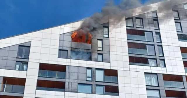 Footage shows thick plumes of smoke coming from two flats on the tenth and eleventh floors