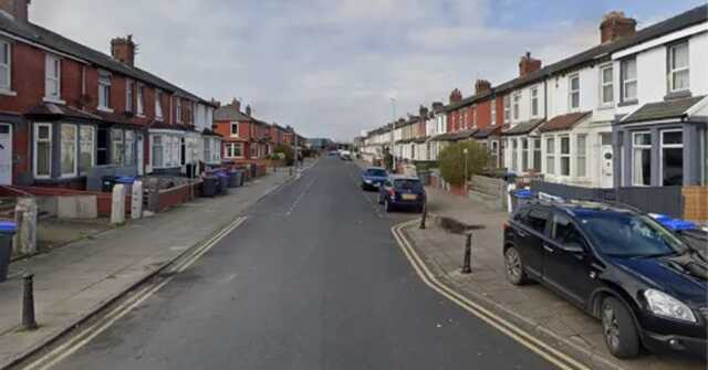 The body was found in a vehicle parked near a children’s play area and a GP practice (Picture: Google Maps)