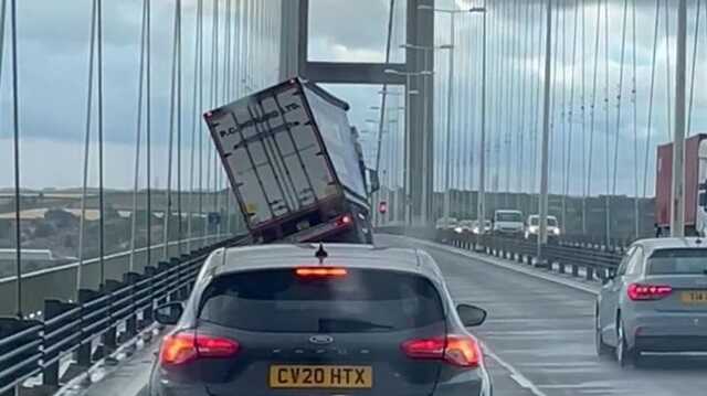 Terrifying moment as Storm Lilian’s 70 mph winds nearly blow lorry off 100 ft high bridge