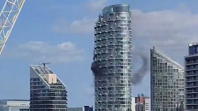 Blackwall fire: 70 firefighters tackle blaze as black smoke billows from block of flats