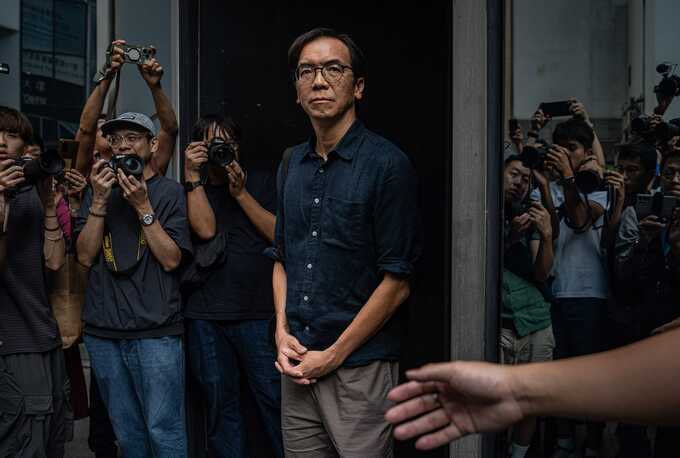 Chung Pui-kuen, former editor-in-chief of Stand News, leaves Wanchai Law Court on bail following the verdict in the Stand News sedition case in Hong Kong on Aug. 29, 2024.