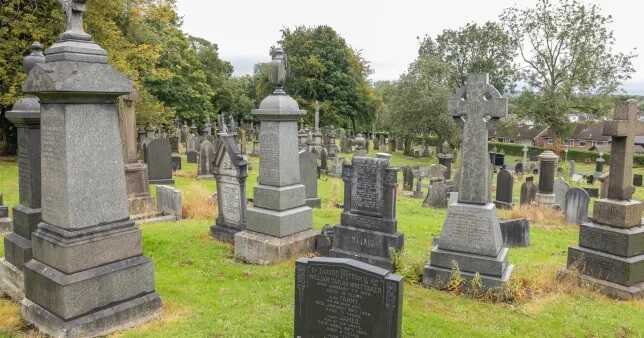 The 303 human remains were found unmarked 12ft by 12ft plot in Royton Cemetery (Picture: Jason Roberts/Manchester Evening News)