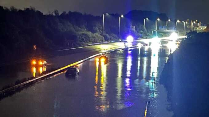 M5 flooding leaves motorists stranded and needing rescue after heavy downpour