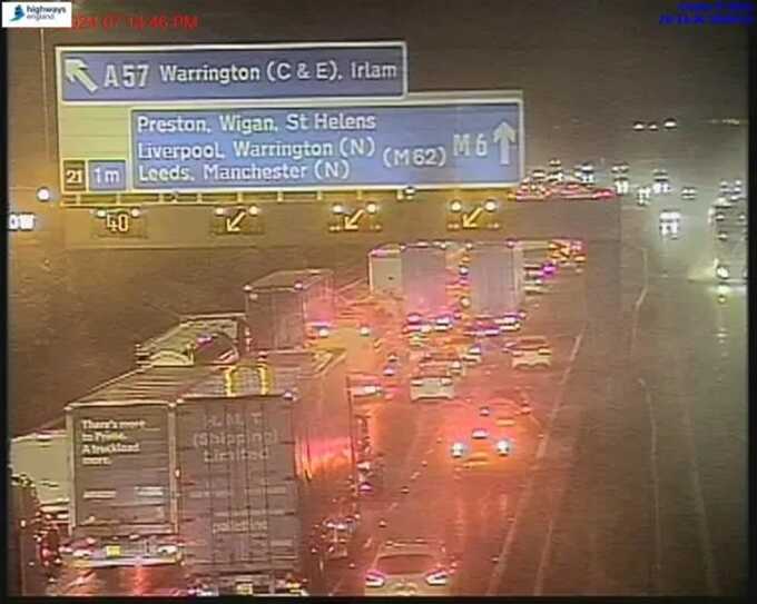 M6 closed after lorry falls off bridge and crashes into ground below