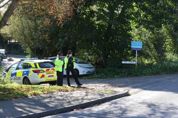 Police at the scene in Sunbury Lock near Wheatleys Eyot in Surrey ( Image: UKNIP)