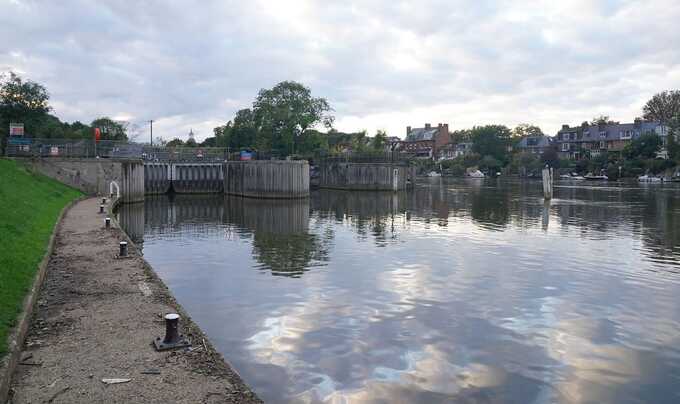 The search is still underway for a man after a rowing boat overturned in the Thames