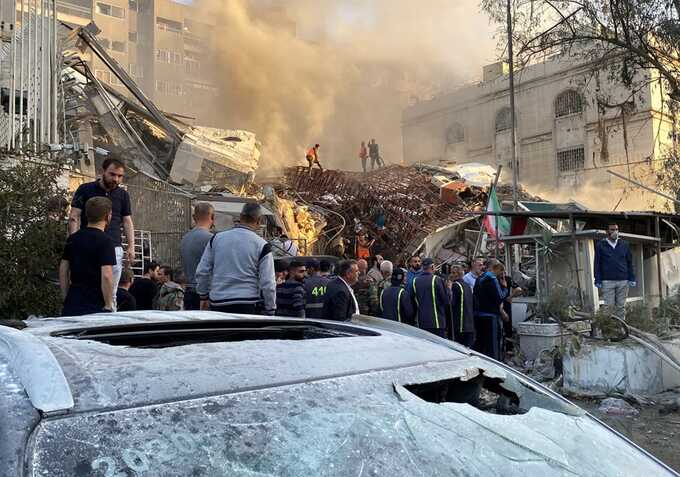 Smoke rises after what the Iranian media said was an Israeli strike on a building close to the Iranian embassy in Damascus, Syria on 1 April. Photograph: Firas Makdesi/Reuters