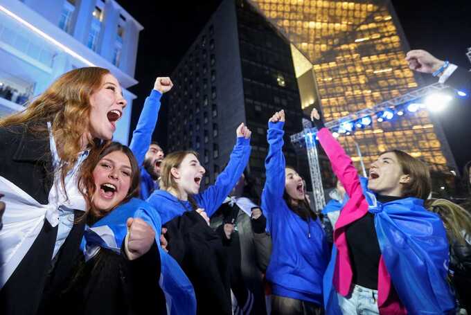 Supporters of the Georgian Dream party celebrate after the announcement of exit poll results in Tbilisi. Photograph: Irakli Gedenidze/Reuters