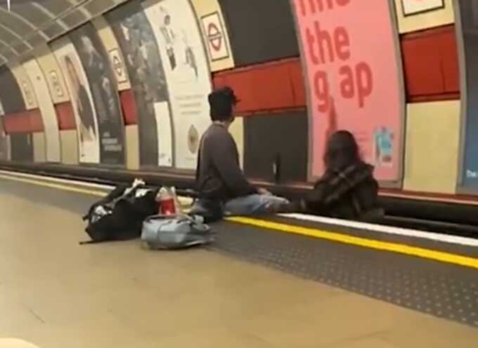 Fools caught sitting on Tube tracks at Underground station