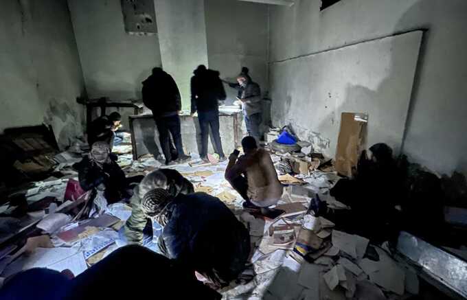 Teams looking for secret compartments in Sednaya prison on Monday. Photograph: Anadolu/Getty Images