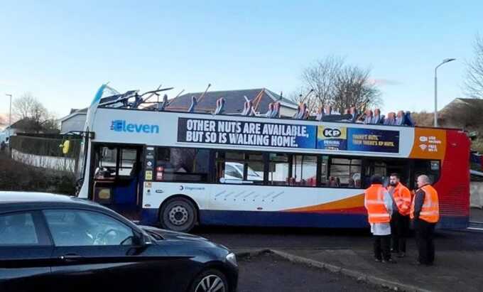 Four hurt after double decker bus roof torn off