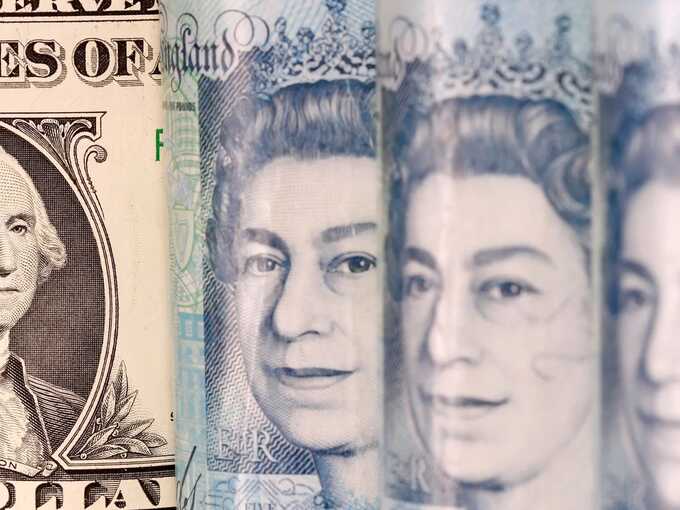 Pound falls below $1.23 to 14-month low