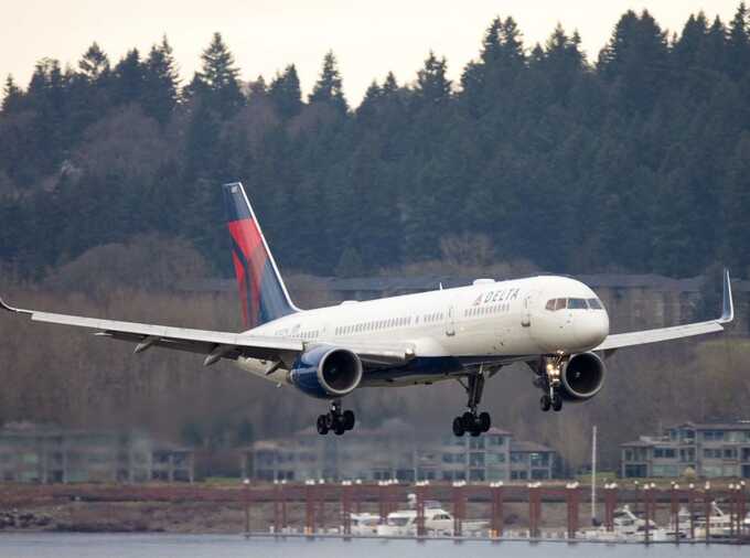 Delta passengers evacuate using slides after engine issue