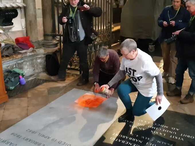 Eco-activists deface Charles Darwin’s grave in Westminster Abbey during protest