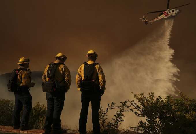 Dozens of Los Angeles wildfire looters pictured, including a man carrying a dagger