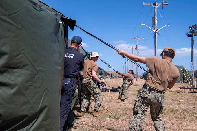 US military begins flying migrants to Guantanamo Bay for the first time