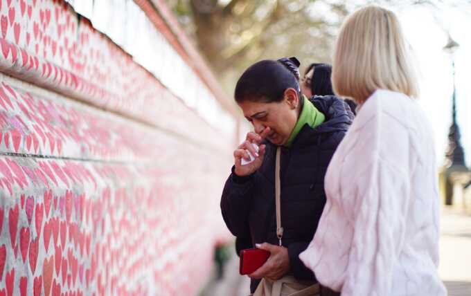 A ceremony was held at the National Covid Memorial Wall in central London. Pic: PA