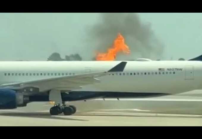 A video showed flames coming from the right side of the plane