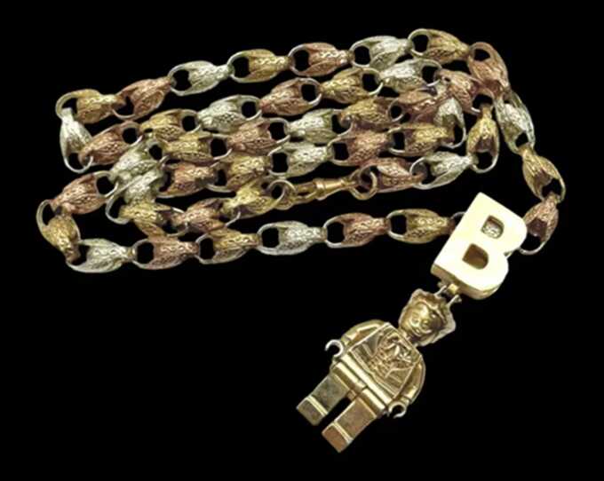 A gold Lego chain is among the gangsters’ bling in a cut-price auction on behalf of law enforcement (Picture: Wilsons Auctions)