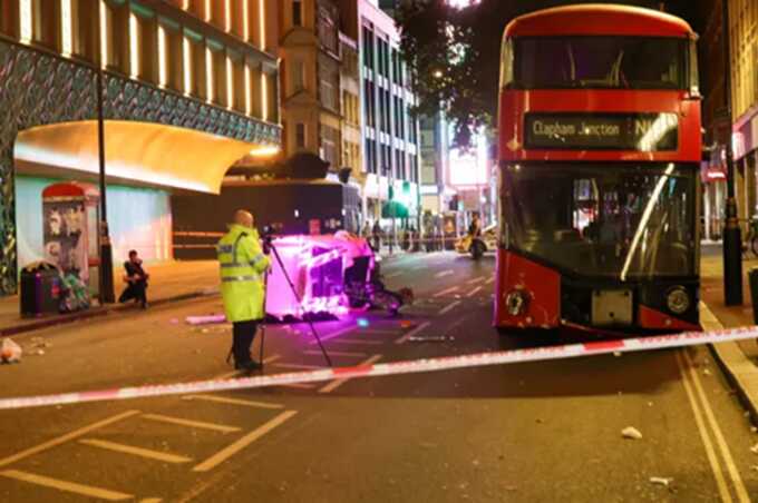 Three people seriously injured after a rickshaw and bus collision in central London