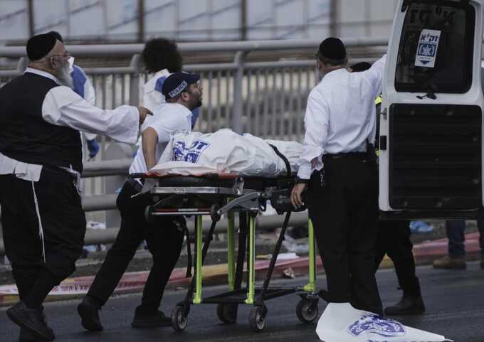 Palestinian gunmen kill 6, wound 12 in North Jerusalem attack