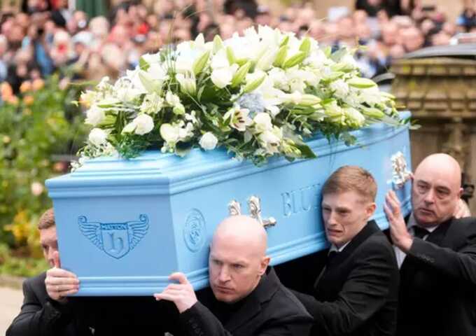 Boxing legend Ricky Hatton laid to rest as thousands line Manchester streets