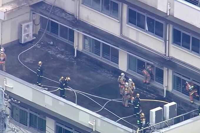 Tokyo schoolchildren escape through windows as fire tears through elementary school