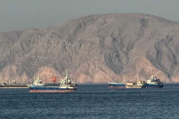 Tanker erupts in flames after being hit by unidentified projectile off Oman coast, UK agency says