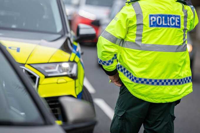 Three arrested after youths attack police and torch vehicles in west Belfast