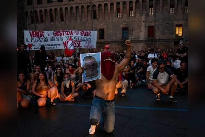 Police clash with protesters after man dies restrained by officers in Italy