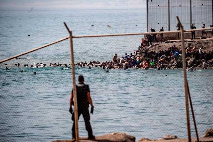 Thousands of migrants overwhelm Ceuta after mass crossing from Morocco