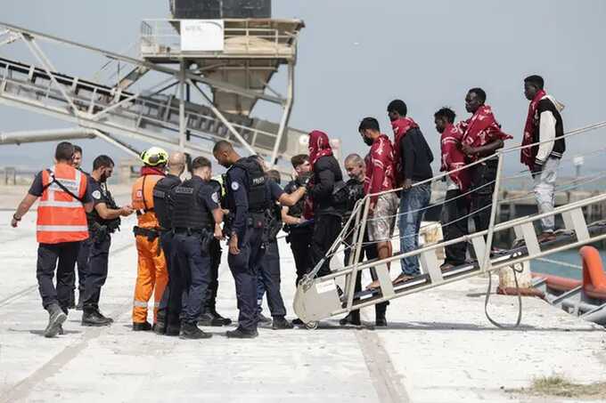 Record 173 migrants rescued after Channel boat catches fire off French coast
