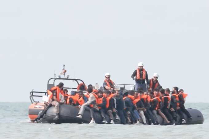 Record 230 migrants cross English Channel on single “mega dinghy”