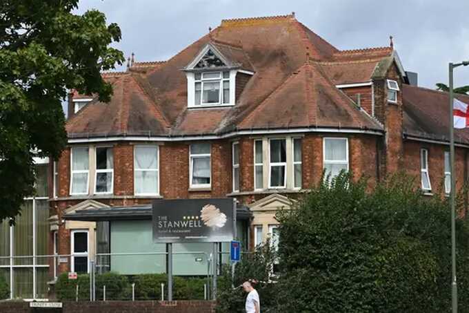 Man arrested for attempted murder after stabbing at Surrey asylum hotel