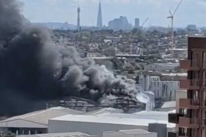 Huge fire erupts near Wembley as 125 firefighters battle blaze behind IKEA