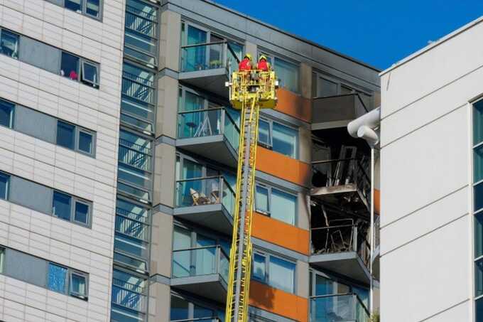 Man dies in east London flat fire as dozens flee building