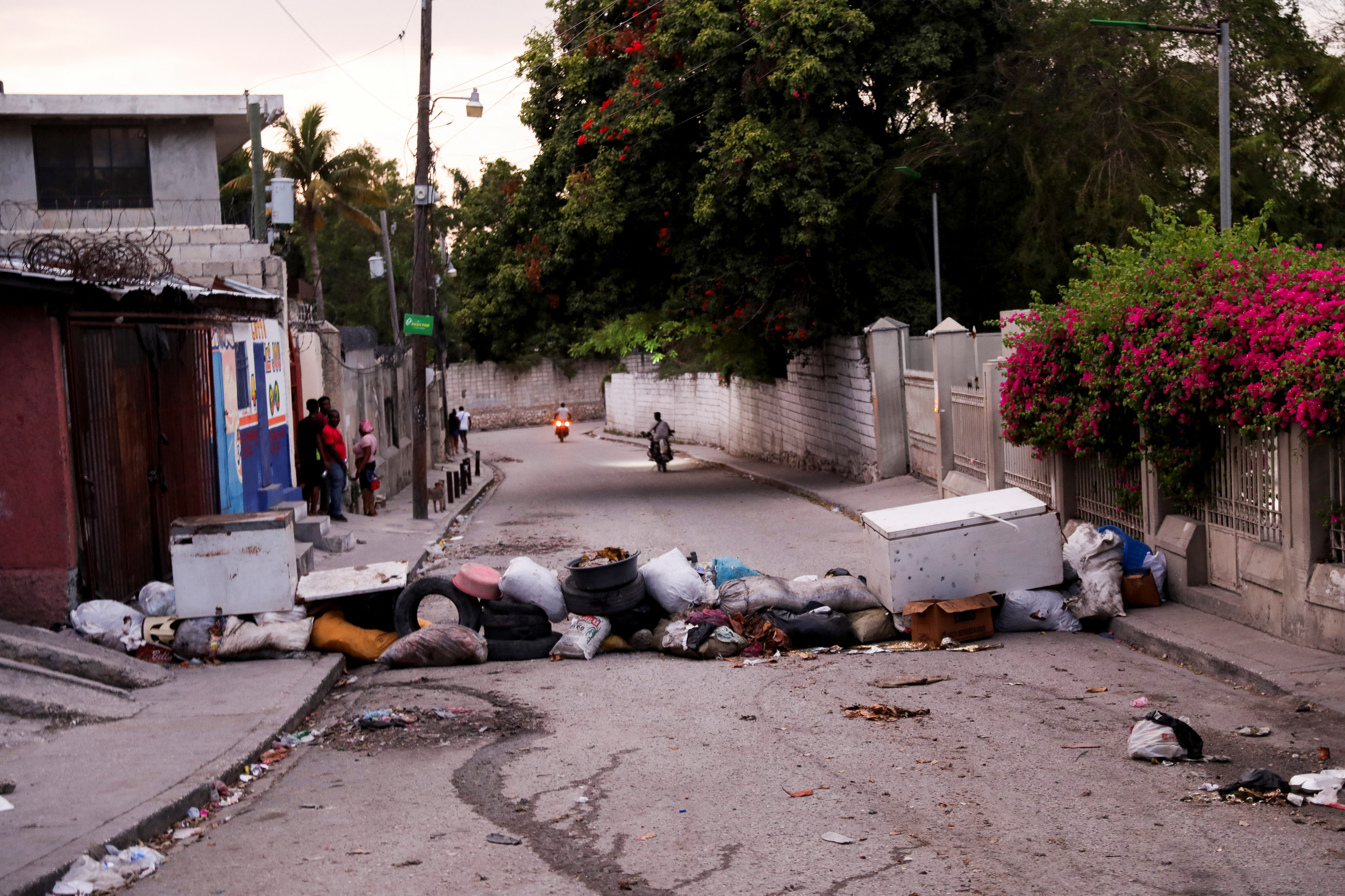 Residents in Port-au-Prince have constructed makeshift barricades made of kitchen appliances and clothes