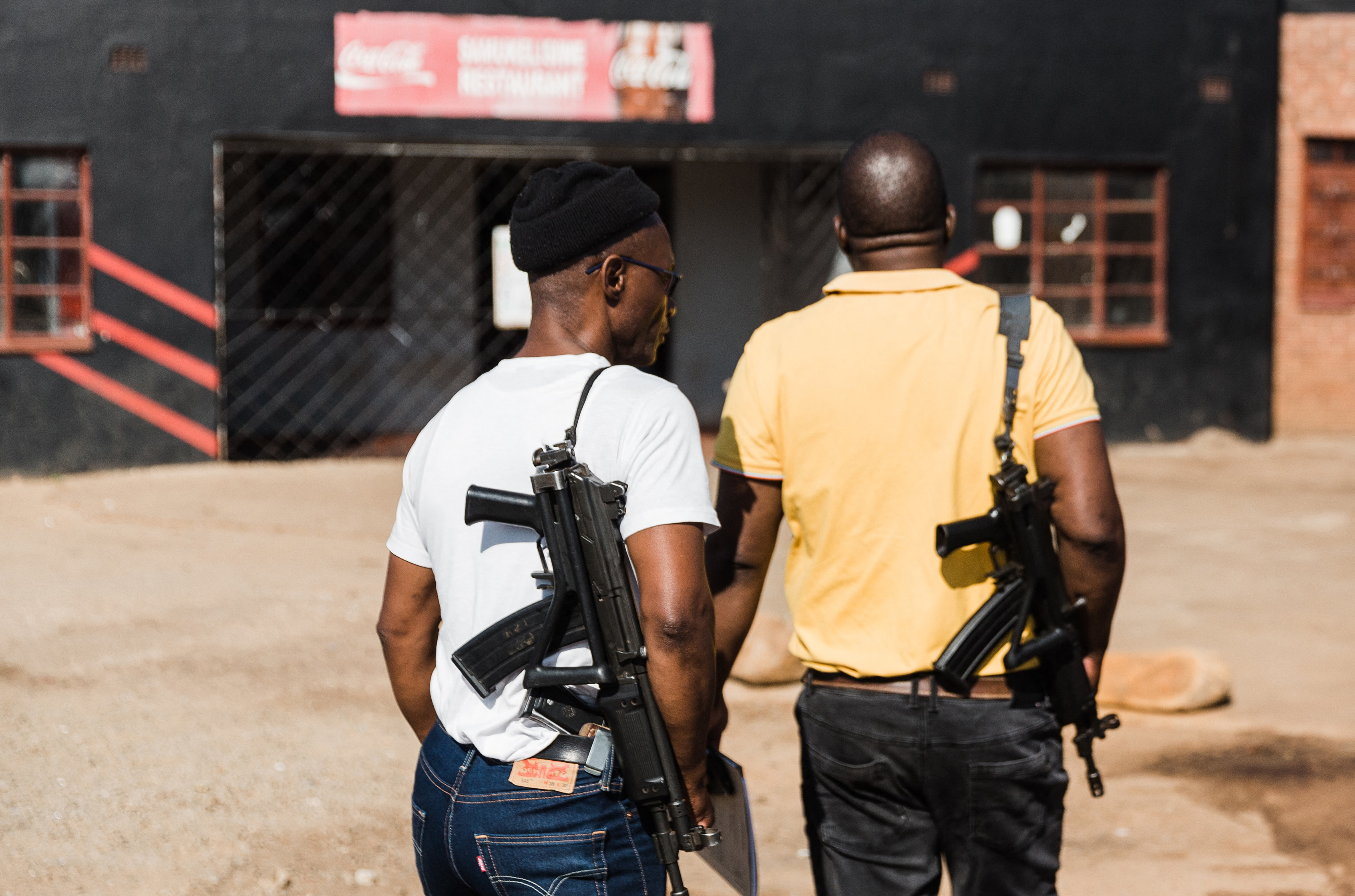 Security guards with automatic weapon in Pietermaritzburg, after a shooting in 2022
