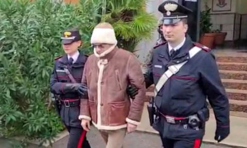 Matteo Messina Denaro the country’s most wanted mafia boss being escorted out of a Carabinieri police station after he was arrested in Palermo, Italy in 2023. A THIRD PARTY./File Photo