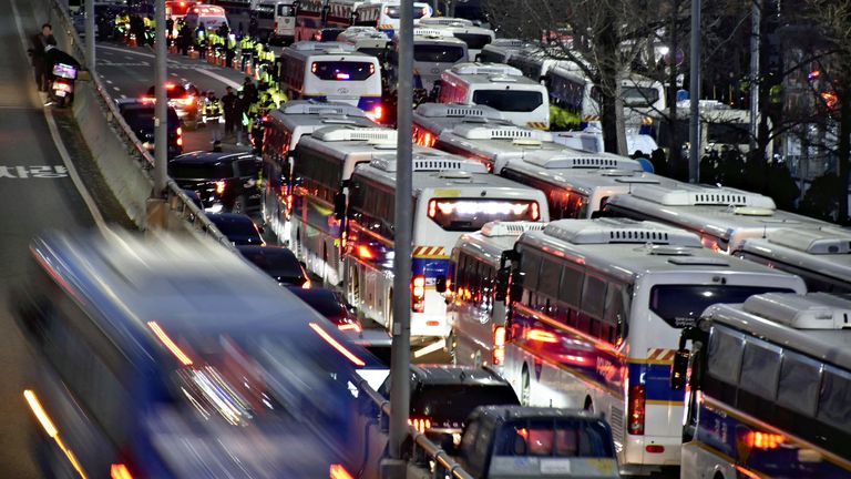 Many police vans are lined up in front of South Korean President Yoon Suk Yeol’s official residence in Seoul on January 3, 2025.( The Yomiuri Shimbun via AP Images )