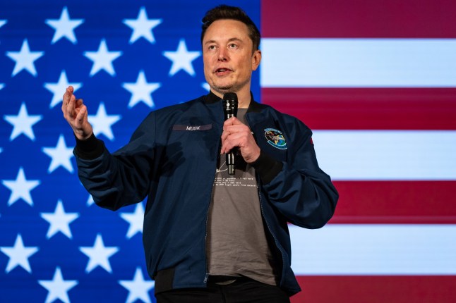 LANCASTER, PENNSYLVANIA - OCTOBER 26: SpaceX and Tesla founder Elon Musk speaks during an America PAC town hall on October 26, 2024 in Lancaster, Pennsylvania. Musk has donated more than $75 million to America PAC, which he co-founded with fellow Silicon Valley venture capitalists and tech businessmen to support Republican presidential nominee, former U.S. President Donald Trump. (Photo by Samuel Corum/Getty Images)