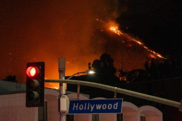 Flames are seen on the hillsides above Hollywood eiqetidrqiquqinv