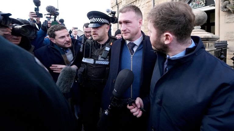 Former Scotland rugby captain Stuart Hogg leaves Selkirk Sheriff Court.
Pic: PA 
