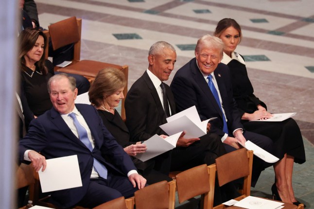 Former U.S. President Barack Obama, former U.S. President George W. Bush and U.S. President-elect Donald Trump react on the day of the State Funeral for former U.S. President Jimmy Carter at the Washington National Cathedral in Washington, U.S., January 9, 2025. REUTERS/Brendan McDermid TPX IMAGES OF THE DAY