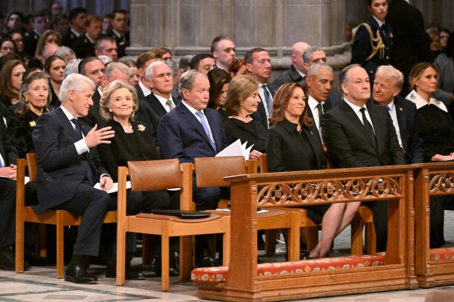 From L to R, former US President Bill Clinton, former Secretary of State Hillary Clinton, former President George W. Bush, his wife Laura Bush, Second Gentleman Doug Emhoff, Vice President Kamala Harris, President-elect Donald rump and his wife Melania Trump attend the State Funeral Service for former US President Jimmy Carter at the Washington National Cathedral in Washington, DC, on January 9, 2025. (Photo by ROBERTO SCHMIDT / AFP) (Photo by ROBERTO SCHMIDT/AFP via Getty Images)